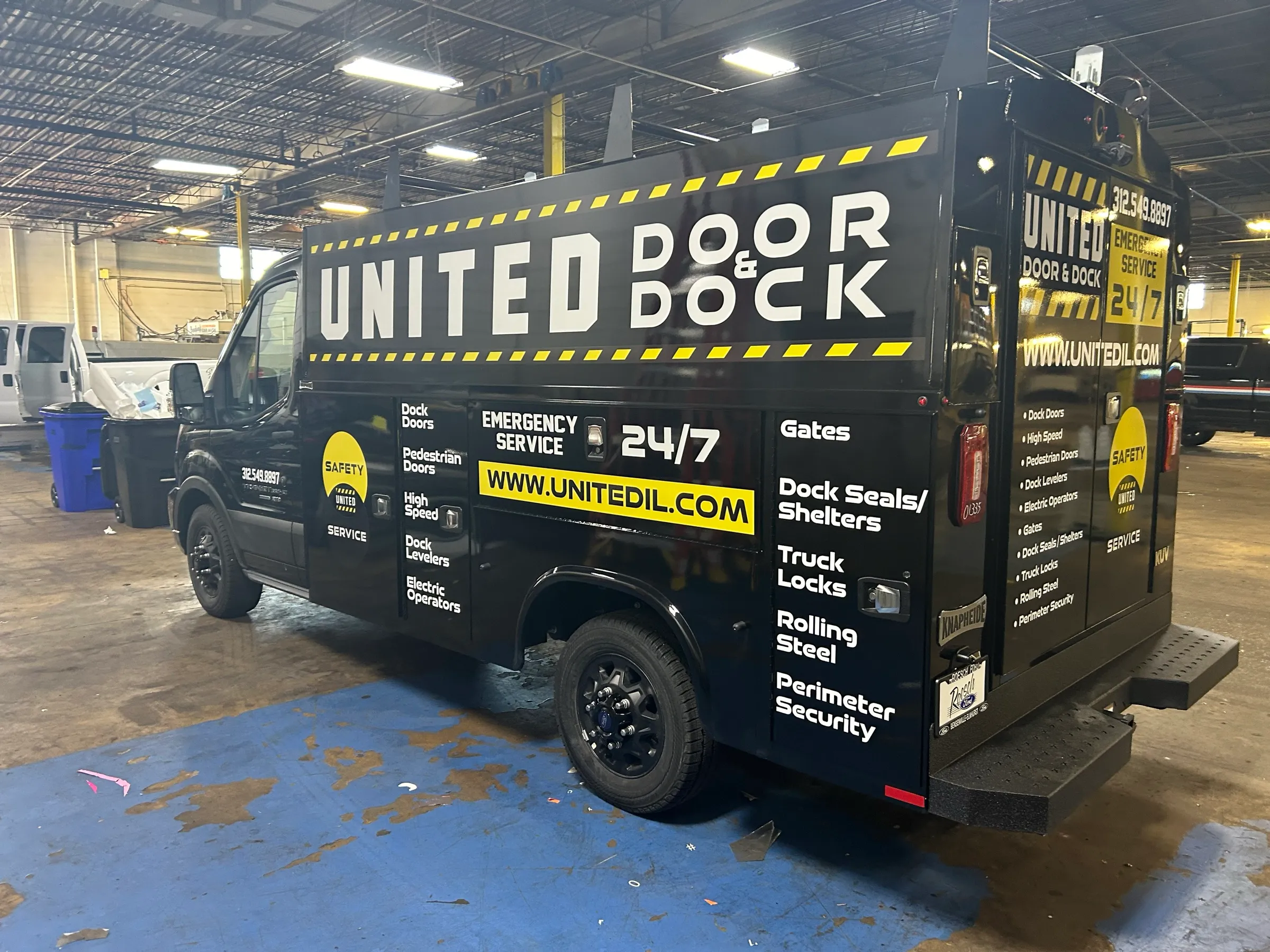 Vehicle wraps — United Door & Dock — every service on one side